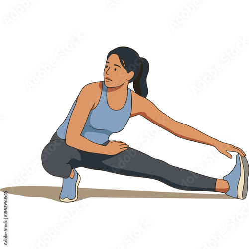 Woman performing leg stretch exercise in fitness routine on floor