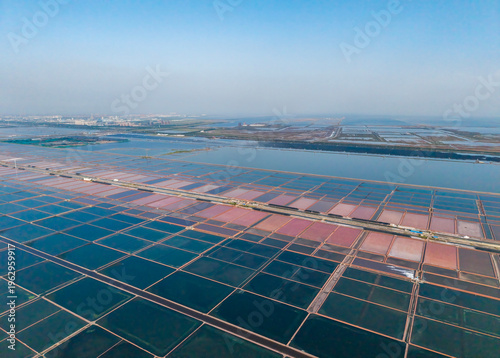 Aerial view of the colorful salt fields and salt-making site by the coast of Tianjin	