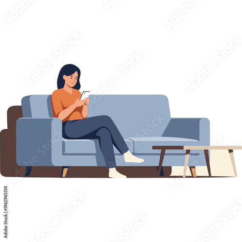Woman sits on couch reading book in living room with coffee table