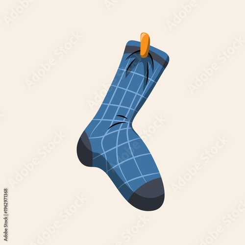 A single blue plaid sock with dark toes and heel, hanging from an orange clothespin against a light background.