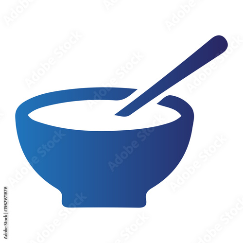 A blue bowl contains a white substance with a spoon inside.