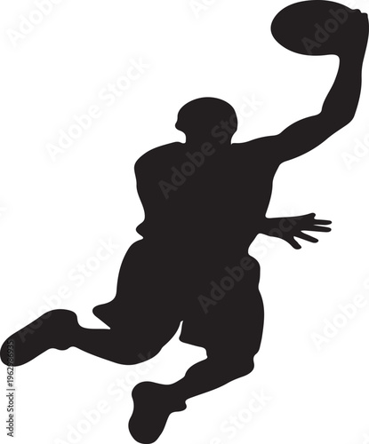 Isolated silhouette of a basketball player in mid-jump during a shot attempt