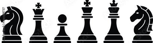 Black and white chess pieces set displaying various figures and pawns
