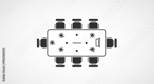Overhead view of a conference table with chairs and objects.