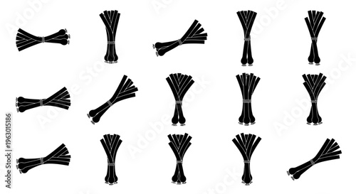 Black zip ties on white background cable organizers cord management wire bundles fasteners