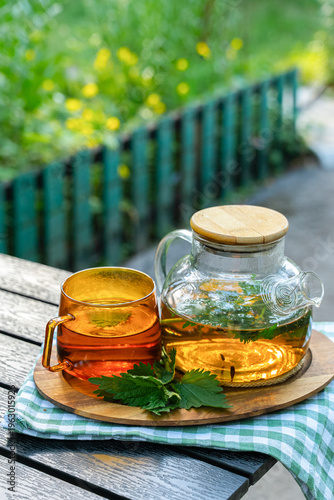 Herbal detox tea in glass teapot for natural care