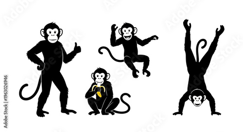 Set of Four Black Monkey Silhouettes in Various Poses.