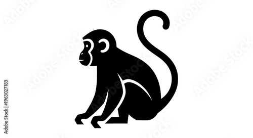 Silhouette of a Sitting Monkey with a Curled Tail.