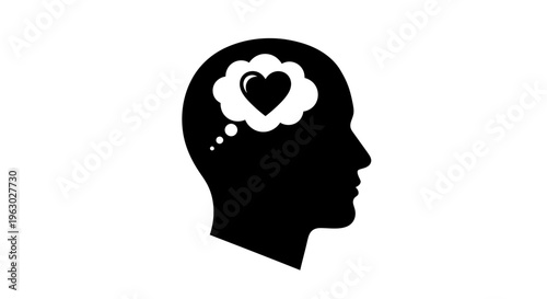 Silhouette of a human head with a heart in a thought bubble.