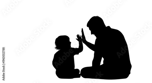 Silhouette of Father and Child Giving High Five.