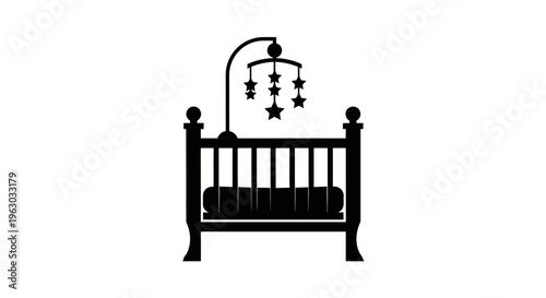 Silhouette of a Baby Crib with a Mobile.