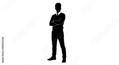 Silhouette of a confident businessman standing with arms crossed.