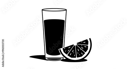 Tall glass of dark liquid with orange slice.