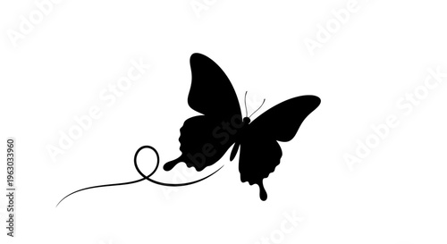 Elegant Black Butterfly Silhouette with Flowing Trail.