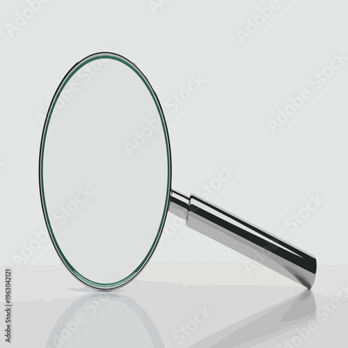A magnifying glass with a silver handle on a reflective surface for inspection and investigation purposes in a clean environment
