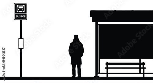 A person waits at a bus stop under a shelter black silhouette