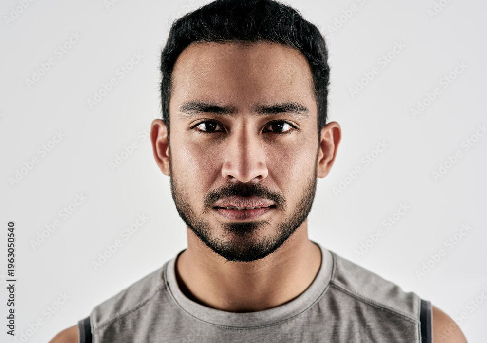 Fototapeta premium Serious, portrait and man with fitness in studio for confidence, exercise pride and healthy body. Personal trainer, bodybuilder and membership for training, sportswear and athlete on white background