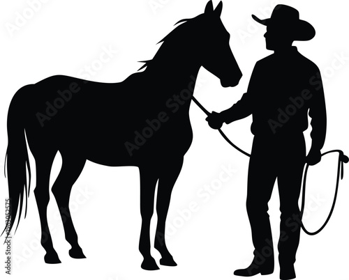 Silhouette of a cowboy and his horse standing side by side