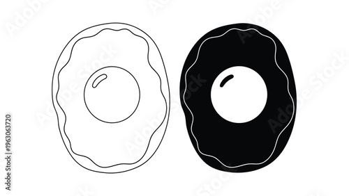A simple illustration displays two fried eggs one white and one black side by side