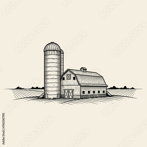 Rustic barn and silo in a harvested field