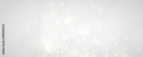 Fotografía Yellow sparkling dust drifts through light with shimmer, glitter