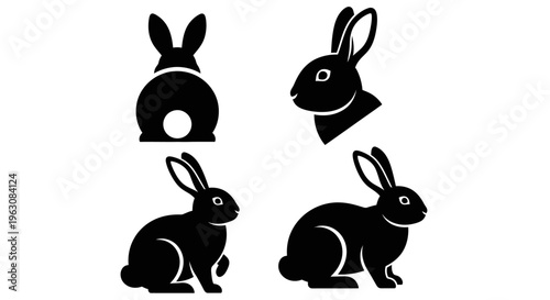 Four black rabbit silhouettes in various poses, showcasing different angles and profiles of the animal.