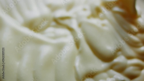 Filling the pan with cheesecake mixture for baking