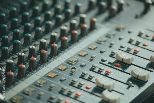 Obraz na plátně Mixing console. Audio mixer. Green tint of light