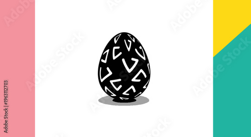 Black egg with white geometric patterns standing upright.