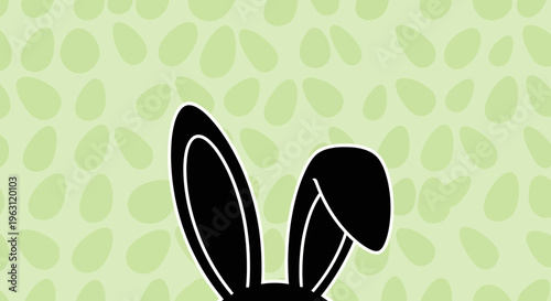 Black bunny ears peeking up, symbolizing Easter and spring.