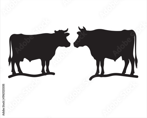 Two black silhouettes of cows facing each other in profile.