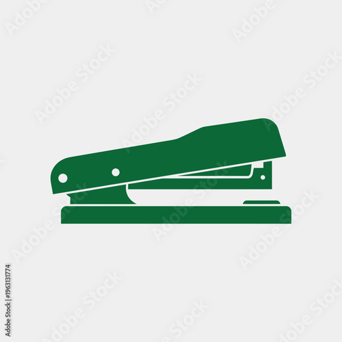 Green metal office stapler device.