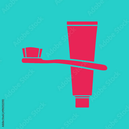 Toothpaste and toothbrush on surface.