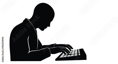 Man in a suit typing on a keyboard with focused expression and professional posture shown