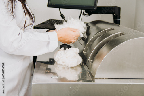 An industrial Uster HVI cotton fiber analyzer machine  in a professional laboratory setting.
