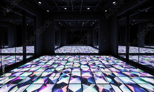 The Decentralized Dance Floor - An expansive, dark room with a floor made of interactive LED panels that light up
