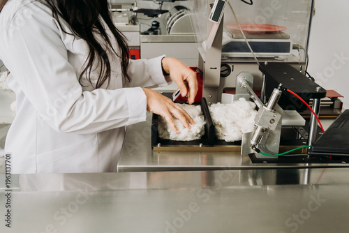 An industrial Uster HVI cotton fiber analyzer machine  in a professional laboratory setting.
