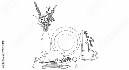 Elegant table setting with floral arrangement, plates, cup, and cutlery