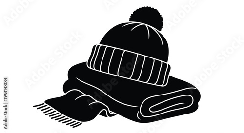 Folded winter clothing including a hat and scarf silhouette