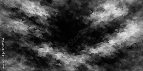 Dramatic black and white abstract grunge background featuring dark storm clouds and a smoky texture to create an overcast nature cloudscape