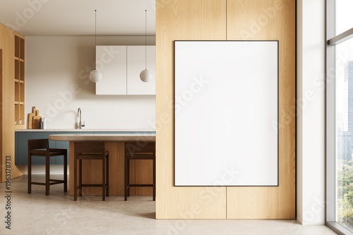 Modern kitchen interior featuring wooden cabinetry, island seating, pendant lighting and a large blank poster mockup displayed on a clean wall beside window view. 3D Rendering