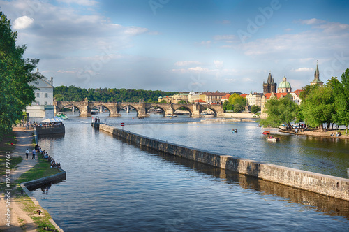 Charles Bridge crossing Vltava River in Prague, Czech Republic
