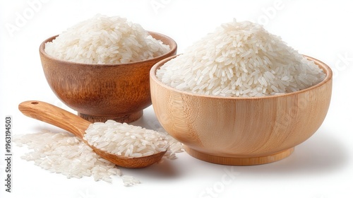White long grain rice filling wooden bowls with a spoon, representing staple food for cooking healthy and nutrition