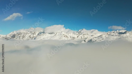 Snowy Swiss Alps mountain range panorama with clear blue sky in Zermatt Switzerland