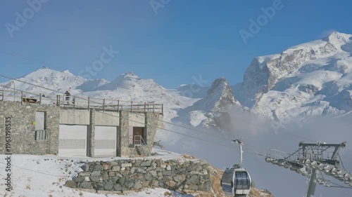 Alpine ski resort building with Matterhorn mountain and snow in Zermatt Switzerland