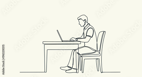 Man sitting at desk with laptop.