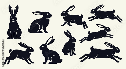 Collection of black rabbit silhouettes in various poses, including sitting, standing, and running.