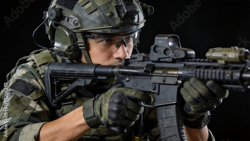 Soldier in combat gear aiming rifle