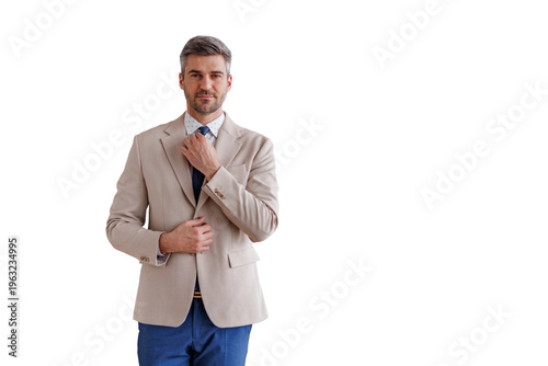 Well-dressed businessman adjusting tie, preparing for meeting, professional style, transparent background