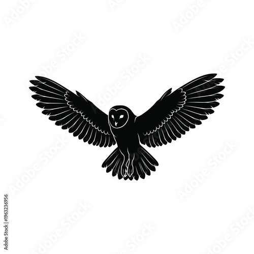 Black silhouette of an owl in flight with outstretched wings on white background